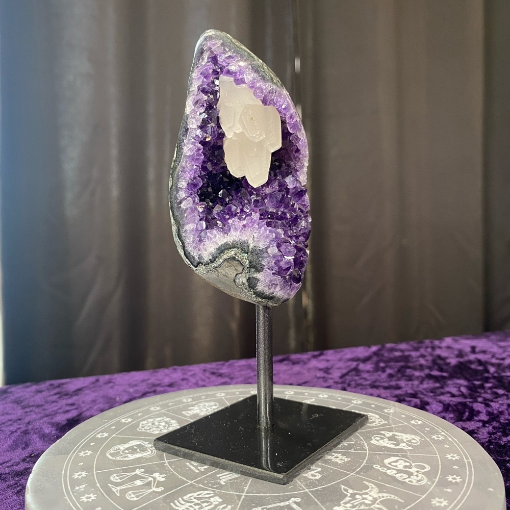 Amethyst with calcite on stand 🦄🤍🦄

AC01